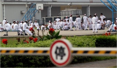 Trabalhadores em greve na fábrica da Honda em Foshan, Guangdong