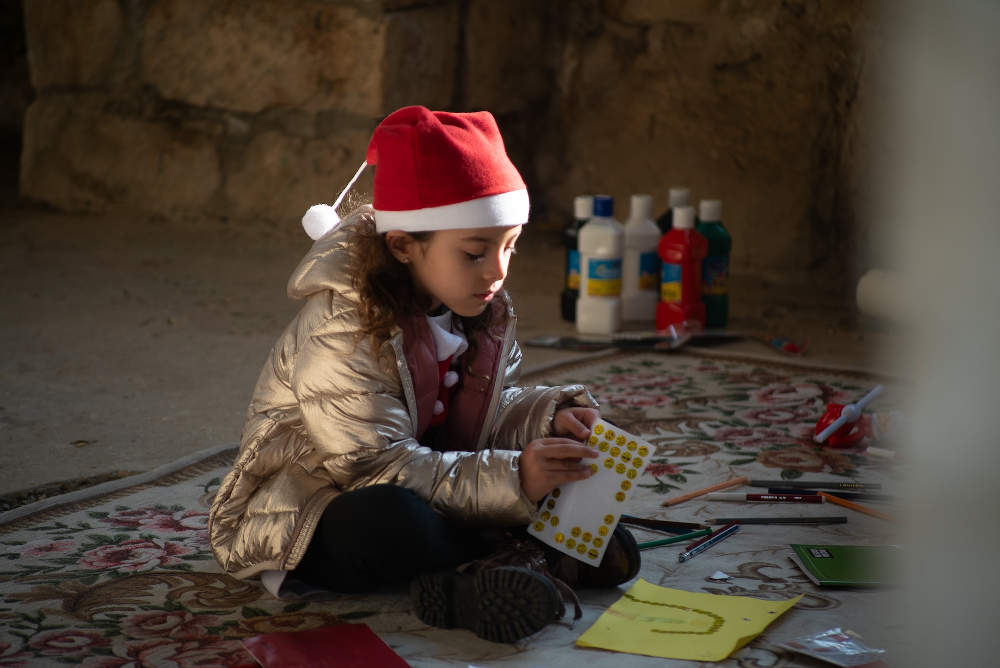 Atividades infantis no mercado de Natal em Bir'im, 13 de dezembro de 2025.