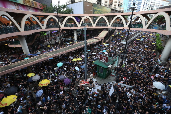 Hong-Kong, marcha de protesto contra o governo de Carrie Lam, 21 de julho de 2019 - Foto de Jerome Favre/Epa/Lusa