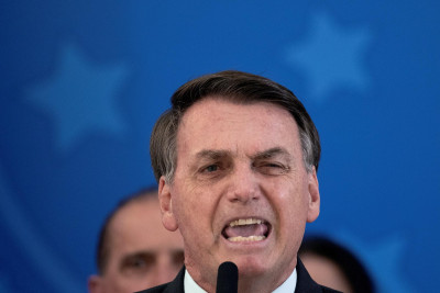 Bolsonaro na conferência de imprensa onde atacou o ex-ministro Moro. Foto de Joédson Alves/EPA/Lusa.