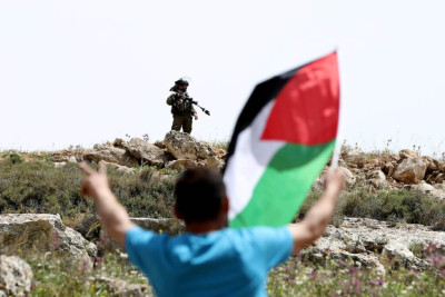 Protesto palestiniano contra a expansão de colonato junto à aldeia de Beit Dajan, Abril de 2022