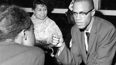 Malcolm X num evento de boas-vindas da American Students Foundation em 1959 ou 1960.