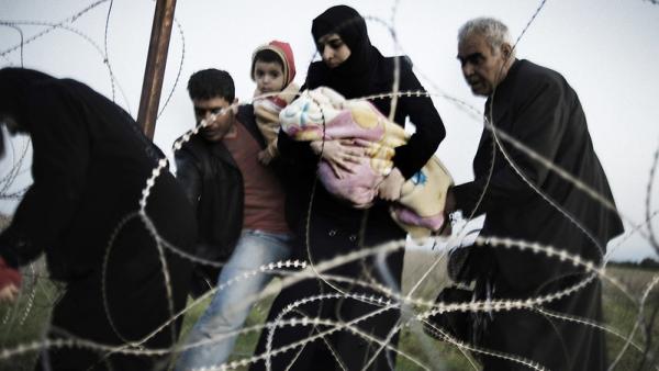 Refugiados sírios tentam entrar na Turquia. Abril de 2012. Foto de Andreas H. Landl/Flickr.