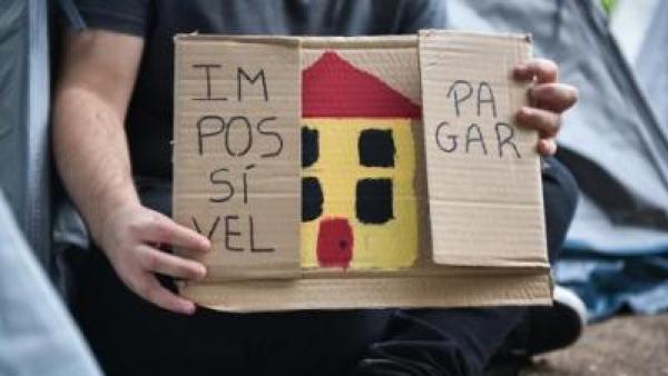 Cartaz onde se lê "Impossível pagar