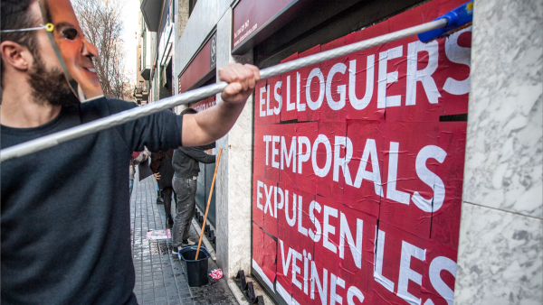 Cartaz contra o alojamento local em Barcelona.