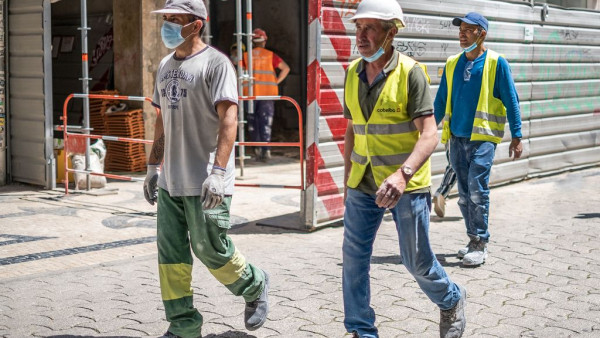 Trabalhadores da construção.