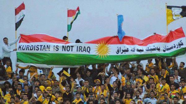 Faixa com a frase “Curdistão não é Iraque” - Foto de kurdistan24.net