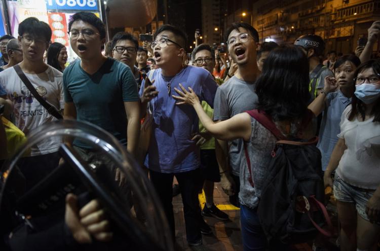 Protestos na zona de Taikoo, Hong Kong, 11 de agosto de 2019. Foto: Miguel Candela/EPA/Lusa.