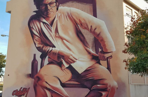 Zeca Afonso retratado na empena de um prédio situado na Amadora. Foto Odeith.com