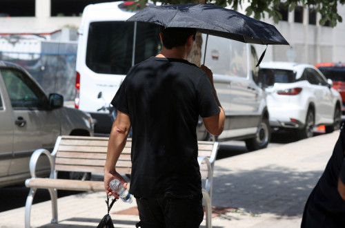 Onda de calor no Texas. Foto de ADAM DAVIS/EPA/Lusa.