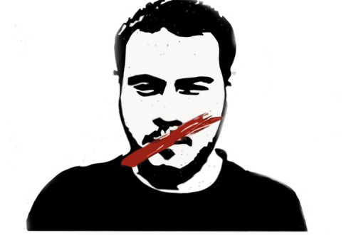 Imagem de Pabo Hásel num cartaz de uma manifestação pela amnistia.