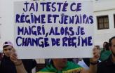 No cartaz lê-se: "Testei este regime e não emagreci, então mudo de regime"