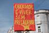 Cartaz: "Liberdade é viver sem precariedade"