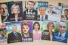 Cartazes da primeira volta das eleições presidenciais francesas. Foto de CHRISTOPHE PETIT TESSON/EPA/Lusa.